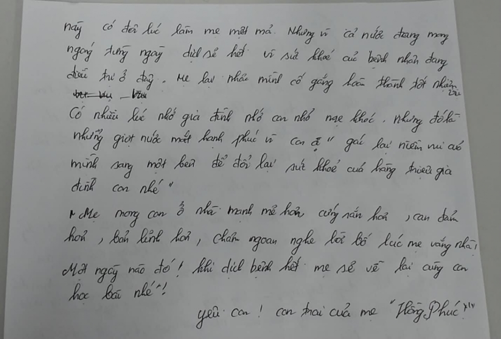 Chị Phan Thị  Hương, gia đình chị Hương và bức thư chị gửi con trai.